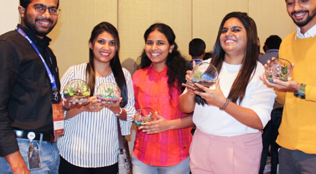 TINKR participants sharing the terrariums they created