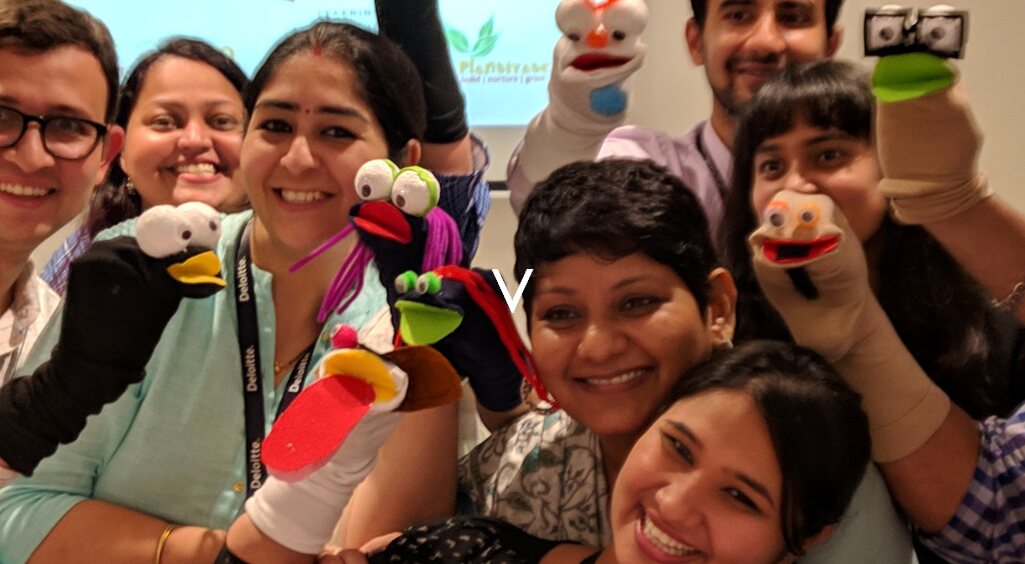 TINKR participants creating puppet characters in a theatre activity